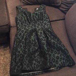 Leopard print emerald green cocktail dress.
